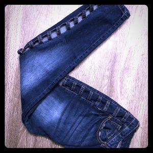 Juniors size 17 jeans with peekaboo holes on legs
